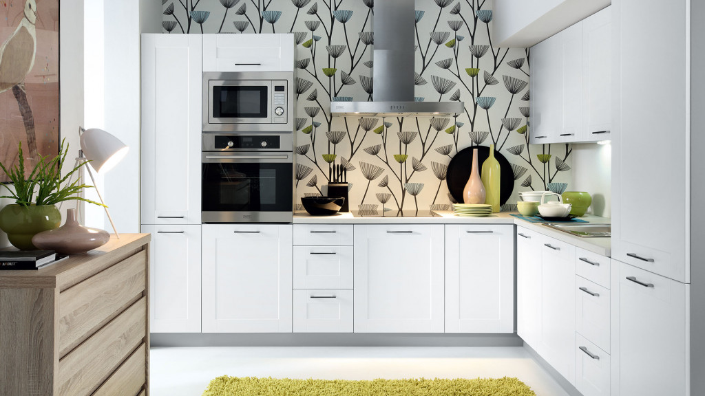 White kitchen with a white worktop - a minimalist arrangement full of elegance